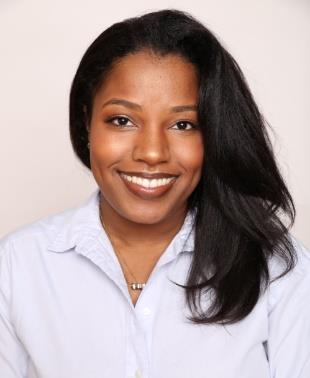 A person smiling for the cameraDescription automatically generated with low confidence